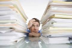 Man Stressed over Book Keeping